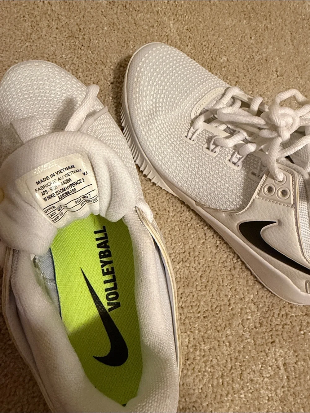 Nike Women's White Sneakers with Black Swoosh